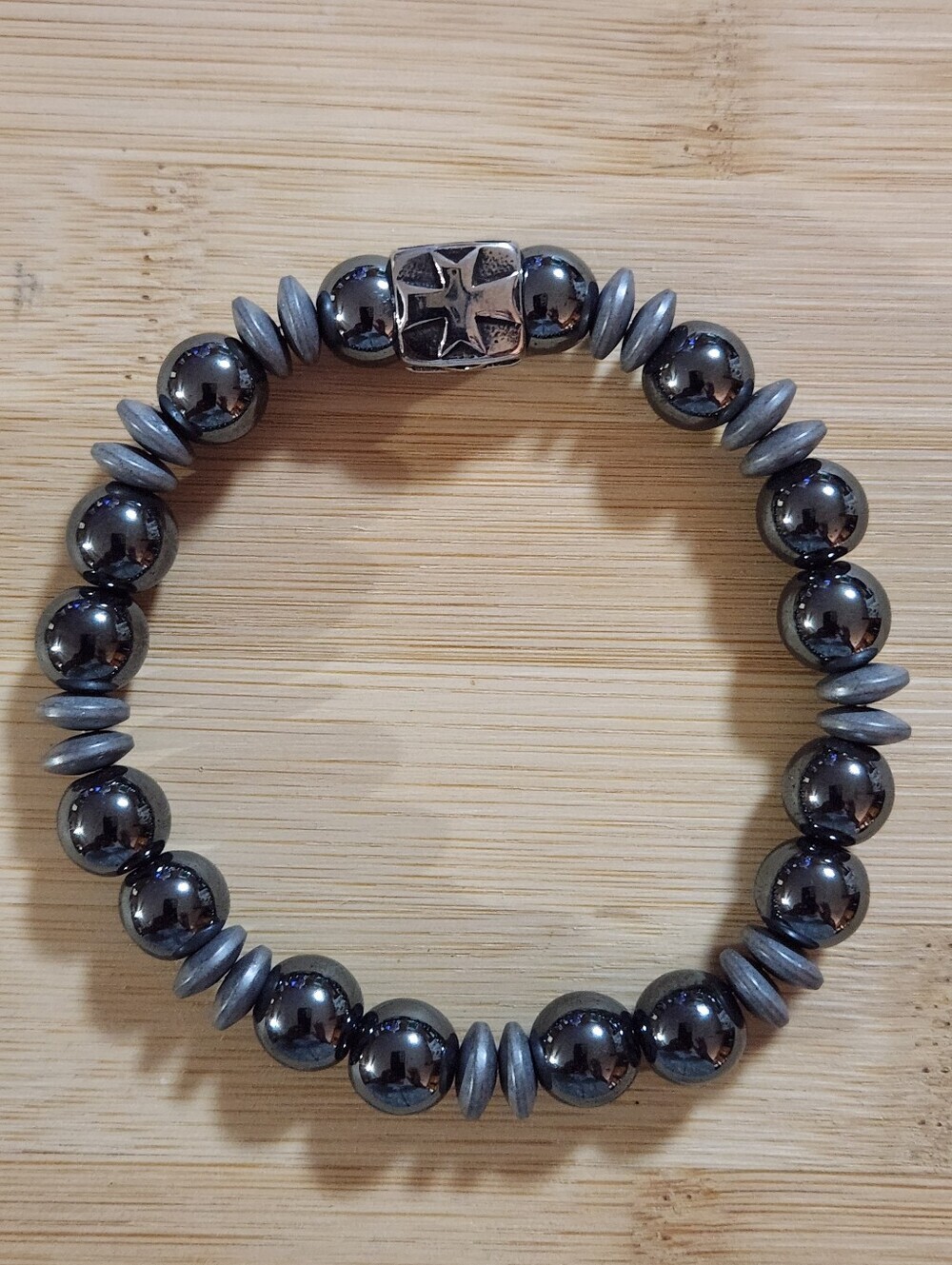 Hand Crafted Hematite Stretch Bracelet with Cross Bead Focal